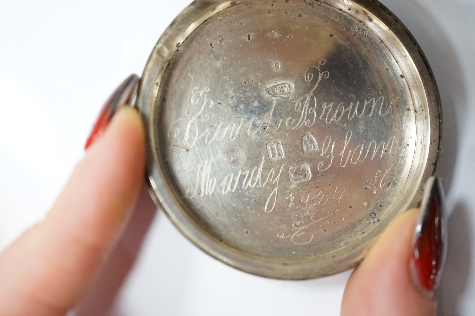 A Victorian silver open face keywind pocket watch by Davies of Ebbe Vale and one other late silver pocket watch. Condition - poor